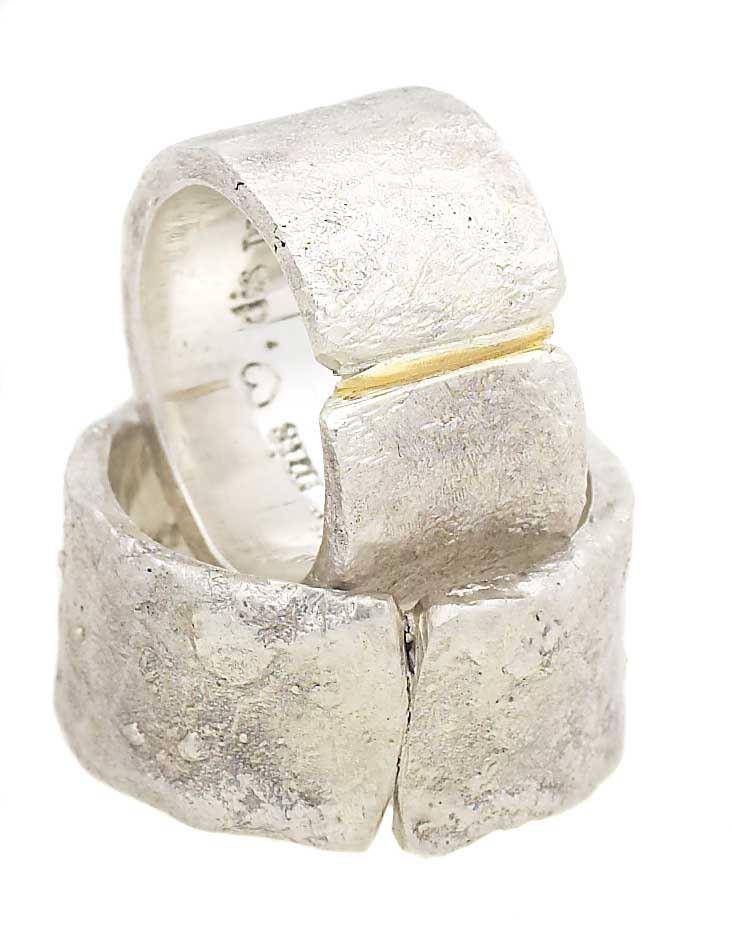 Rough forged silverrings with gold-filled seam