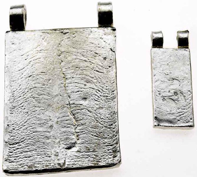 Silver pendants with forging-structures ...